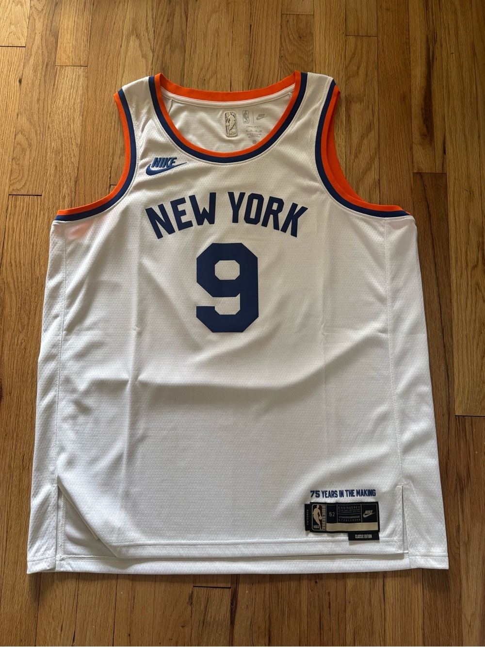 Nike White Basketball Jersey with Blue and Orange Trim. Swingman Edition